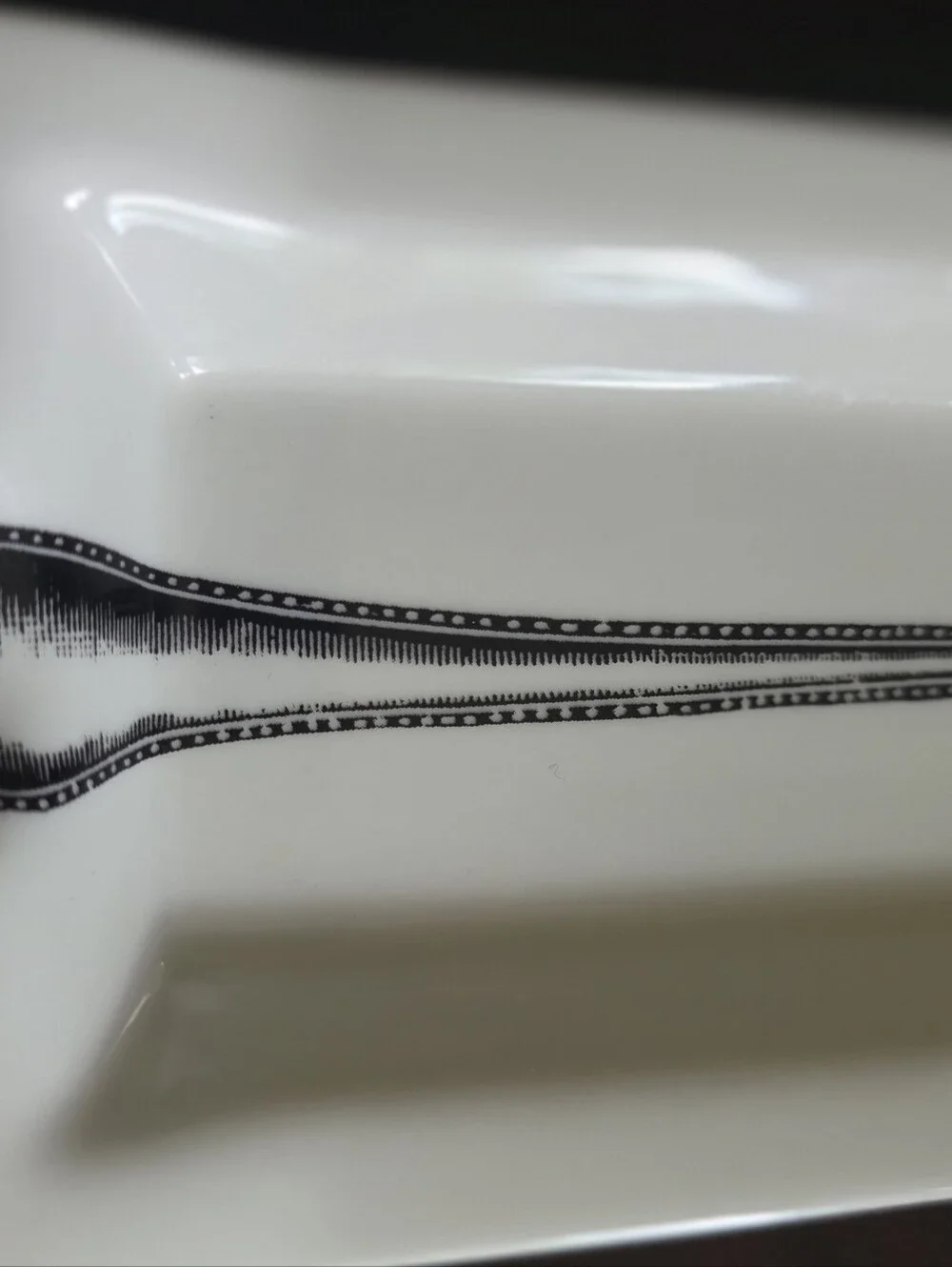Fishs Eddy White Ceramic Spoon Rest with Black Spoon Illustration